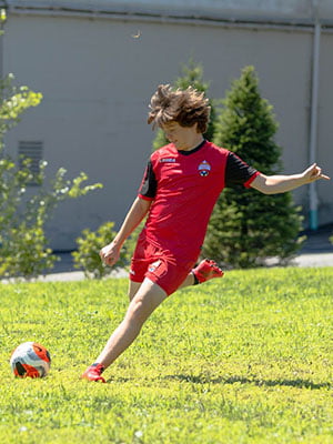 Louis Mohr Playing Soccer Outside